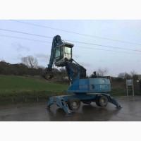 Грейферный перегружатель Fuchs MHL 335