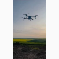 Обприскування агро дроном внесення ЗЗР дисикація