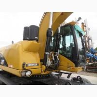 Грейферный перегружатель Caterpillar M318D
