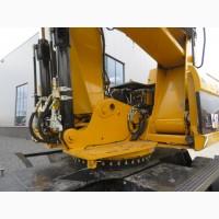 Грейферный перегружатель Caterpillar M318D