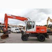 Колесный экскаватор CAT M315