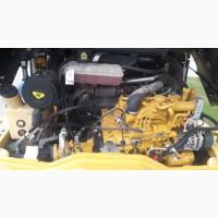 Фронтальный погрузчик Caterpillar 906 H2