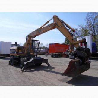Колесный экскаватор Caterpillar M 315 в Украине