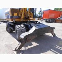 Колесный экскаватор Caterpillar M 315 в Украине