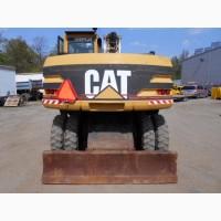 Колесный экскаватор Caterpillar M 315 в Украине