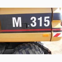 Колесный экскаватор Caterpillar M 315 в Украине